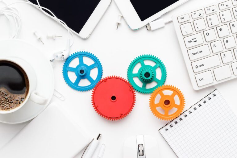 colorful gears on white desk